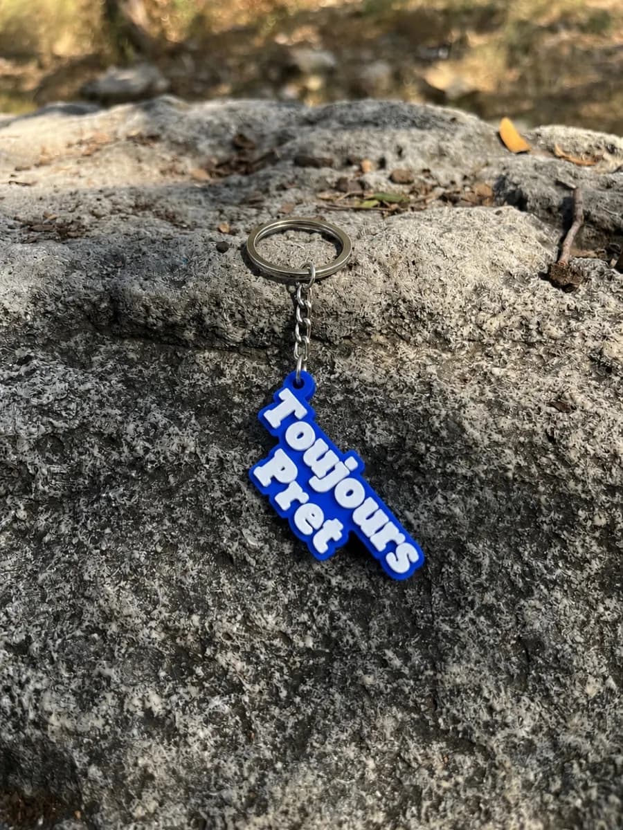 Toujours pret keychain